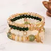 Pulsera Bohemia de venta caliente transfronteriza con colgante de cristal, cuatro pulseras de cuentas de vidrio, elástica, exquisita joya para la mano