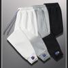 Pantalones deportivos de primavera y verano 2023 para hombre, venta al por mayor, con logotipo impreso, para hombre y mujer, pantalones deportivos ajustados de punto elástico para hombre