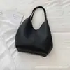 Bolso tote de gran capacidad transfronterizo para mujer, nuevo y moderno de verano 2026, versátil, diario, de nicho, para hombro, bajo el brazo