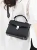 Bolso de mano simple de cuero genuino para mujer, bolso de hombro negro versátil para el día a día, hecho a medida para suministro directo transfronterizo