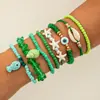 Conjunto de pulseiras de férias estilo boêmio transfronteiriço europeu e americano, pulseira multicamadas com sementes, concha e estrela-do-mar