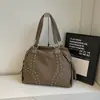 Nueva colección de otoño e invierno: Bolsas sencillas, de gran capacidad y elegantes para mujer, perfectas para uso casual y fáciles de combinar con cualquier atuendo. Bolso de mano retro de un solo hombro 2026