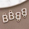 Acero Inoxidable Galvanizado Estilo Europeo y Americano 26 Letras Inglesas Etiqueta Colgante Pulsera Collar DIY Hecho a Mano Accesorios de Joyería
