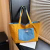 Bolsa de Ombro Casual Nova Primavera 2026 Design de Nicho Bolsa Tote Tendência Personalizada Textura Bolsa de Grande Capacidade para Mulheres