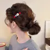 Grampo de Cabelo com Temperamento Retrô para Outono e Inverno para Mulheres 2026 Novo Grampo Lateral de Pérola Redonda Presilha de Cabelo Presilha de Franja com Estampa de Leopardo Acessórios de Cabelo