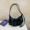 Bolso de Axila de Nicho con Sentido de Diseño Transfronterizo para Mujer 2026 Nuevo Bolso Dumpling de Gran Capacidad Bolso Versátil de Hombro Cruzado