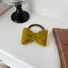 Diadema de terciopelo con lazo para otoño e invierno para mujer 2025 Nueva banda de goma de alta elasticidad y durabilidad Cuerda para el pelo de cola de caballo Cuerda para la cabeza Accesorios para el cabello