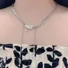 2025 Nuevo Collar de Ojo de Gato Nube Rayo Borla para Mujer Diseño de Nicho Fresco de Moda Cadena Hip-Hop para Mujer