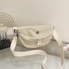 Bolsa Cross-border Niche Canvas Bolsa pequena feminina 2025 Nova bolsa feminina estilo coreano Bolsa crossbody Bolsa de ombro da moda Bolsa de bolinho