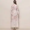 Foto Real de un Vestido Floral de Gasa Estilo Francés con Cintura Ceñida, Cuello en V, Mangas de Farol y Falda Larga Estampada