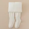 Meias-calças populares de inverno para meninas, de algodão, cor sólida, transfronteiriças, espessadas e quentes, com listras verticais, alta elasticidade, adequadas para bebês e crianças pequenas.