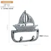 Estilo Europeo Simple Retro Artesanía de Hierro Fundido Gancho de Velero Colgante de Pared Hogar Balcón Tienda de Té con Leche Cafetería Artículo Decorativo