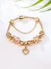 Pulsera de Cuentas con Colgante en Forma de Corazón Popular de Nicho de Alta Gama Transfronterizo, Joyería al por Mayor de Cristal con Forma de Corona de Lujo Ligero para Mujer