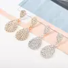 Desejo AliExpress corrente de garra de strass quente brincos de gota d'água moda acessórios de noiva fabricantes atacado E603