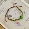 Jingdezhen Pulsera de Cuerda Trenzada de Cerámica Fresca de Navidad Trébol Cuerda de Mano Adorno de Mano Artístico para Atracciones Turísticas Venta al por Mayor
