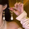 Pendientes Largos de Perlas con Diseño de Pétalos a la Moda, Estilo Versátil de Lujo Ligero, Populares Pendientes y Aretes de Borlas Super Hada para Mujer