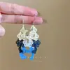 Brincos de Borboleta Vazada com Franjas Dançantes de Verão Super Fada Femininos de Nicho Levemente Luxuosos de Alta Qualidade com Gancho de Orelha Gradiente Brilhante Brincos Exquisitos