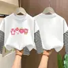 Camiseta de manga larga a rayas de algodón puro para niña, nueva colección de otoño 2026 estilo coreano para niños, look versátil de dos piezas, para niños de talla mediana y grande