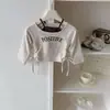 Garota coreana estilosa! Top curto feminino de falso two-piece com cordão, base de manga longa slim fit com estampa de letras para outono