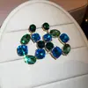 Aretes de aguja plateada con diamantes, diseño de flor ovalada de resina y gota de agua, estilo retro vintage, aretes versátiles