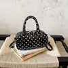 Bolso de mano de moda, bolso cruzado para mujer, bolso de hombro súper popular para el trabajo 2026 con diseño de almohada de lunares