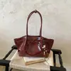 Bolso de mano de nicho estilo coreano transfronterizo, bolso de hombro simple de moda y tendencia para mujer 2026, bolso tote con lazo