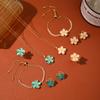 Colar para Mulheres, Conjunto de Três Peças Floral Transfronteiriço Estilo Influenciador da Moda com Brincos Giratórios, Anel, Colar, Corrente Clavicular de Zircônia Micro-Cravada
