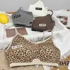 Top cruzado de leopardo para chica popular de principios de otoño, camisola de canalé color block de alta gama, transpirable, push-up, copa fija, espalda bonita