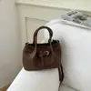 Bolso de Mano para Viajes de Negocios de Mujer 2026 Primavera Nuevo Bolso Tipo Cubo Sencillo Estilo Coreano Moda Casual Bolso Cruzado