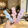 Diadema infantil linda caricatura Sanrio oso fresa accesorios para el cabello estilo coreano nueva diadema para niñas venta al por mayor tienda de dos yuanes