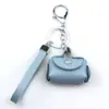 Moda Transfronteriza Colgante Creativo Cuero Ins Bolso de Mujer Llavero Metal Coche Colgante Pequeño Regalo