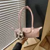 Bolso tipo baguette de lujo estilo francés, bolso tipo dumpling moderno y a la moda, versátil para el uso diario, bolso de hombro y para debajo del brazo de moda