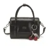 Bolsa de mão lisa, elegante e simples, novo modelo primavera-verão 2026, bolsa de ombro estilosa e moderna, bolsa pequena quadrada crossbody única