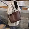 Bolso de moda vintage de gran capacidad para mujer, nuevo modelo 2026, bolso de hombro con textura de alta calidad, versátil para ir al trabajo, bolso tote