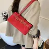 Bolso de Hombro Elegante para Mujer Estilo Commuter Modelo Nuevo 2025 Bolso Tote Sencillo Hebilla de Cinturón a la Moda Bolso de Hombro Personalizado