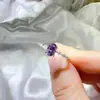 Anillo de moissanita morado con forma de huevo ovalado al por mayor estilo europeo y americano anillo de diamante bolígrafo de prueba cruzada caliente nuevo transfronterizo