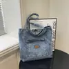 Bolsa de Lona Lavada Estilo Nuevo 2026 Transfronteriza Bolsa de Hombro Estilo Coreano Gran Capacidad Bolsa Casual para el Trabajo Versátil Bolsa para Mujer
