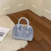 Bolsa Pequena para Mulheres 2026 Cross-Border Nova Moda Retrô Bolsa de Mão Bolsa Concha Bolsa de Ombro Cruzada Casual Simples Bolsa Feminina