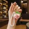 Llavero de flor fresca tejida colgante para bolso Día de San Valentín DIY hecho a mano flor de rosa de ganchillo fruta creativa caqui regalo