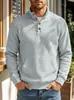 Ropa para hombre TK transfronteriza otoño e invierno tejido gofrado con cuello henley jersey sudadera casual de manga larga de comercio exterior con bolsillo de parche tridimensional