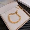 Pulsera de acero de titanio para mujer 2022 nueva versión coreana de la cadena de pulsera trenzada Mori ajustable de tirar que no se desvanece al por mayor