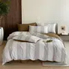 2026 Novo Estilo Ins Fresco e Simples Jacquard Waffle Lavado em Alta Temperatura Algodão 100% Algodão Lavado Conjunto de Quatro Peças - Série de Tecidos