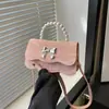 Bolso Lazo de Diseño Nicho para Mujer 2024 Nuevo de Alta Gama Perla Portátil Bolso Cuadrado Pequeño Bandolera de Hombro Trendy