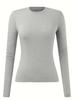 Camiseta informal y cómoda de manga larga con cuello redondo y combinable para mujer europea y americana, de color liso, ajustada, para primavera y otoño.