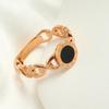 Anillo de marca redondo negro de acero de titanio con números romanos rojo neto personalidad gente de moda no se decolora decoraciones fabricantes mayoreo