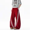Pantalones deportivos casuales a rayas rojas de pierna ancha plisados de corte recto estilo americano, con dobladillo curvo, de moda para la calle, para hombres y mujeres