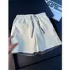 Shorts de secado rápido estilo patchwork americano para hombre, con diseño de bloques de color, un look elegante y deportivo, y corte recto, perfectos para el verano y la playa.