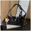 Bolso de hombro de gran capacidad a la moda, nuevo bolso de mano versátil simple de alta gama para ir al trabajo, bolso de mujer color café versión coreana