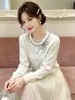 Elegante cardigã de tricô estilo francês para mulheres, coleção primavera e outono 2026, gola redonda com detalhe de laço, suéter casaco suave e estiloso