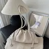 Bolso tejido nuevo de nicho con pliegues y cordón para mujer, bolso nube de moda, bolso de hombro clásico de alta gama de cuero genuino, bolso para el trabajo